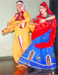 Artistes present a folk dance during the inauguration of an orientation workshop in Chandigarh