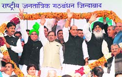 United we stand: (From left) INLD leaders Ajay Chautala and Om Prakash Chautala, JD(U) president Sharad Yadav, BJP national president Rajnath Singh and Punjab Chief Minister Parkash Singh Badal at a rally in Chandigarh on Thursday.