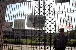 A policeman stands outside the gate of ITM in Sector-23, Gurgaon on Thursday.