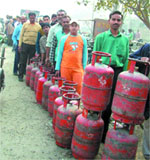 Long queue outside a gas agency due to shortage of LPG cylinders in Amritsar