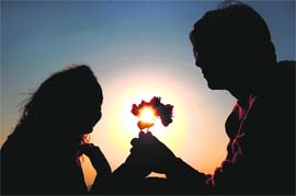 Lovers exchange flowers on the eve of Valentines Day in Dehradun.