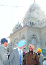 DGP NPS Aulakh talks to a police officer in Amritsar