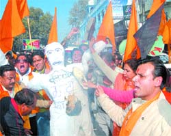 Activists of the Bajrang Dal and Durga Vahini burn an effigy in protest against Valentines Day celebrations in Amritsar on Saturday.