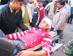 An injured person being shifted to the Government Medical College Hospital, Jammu.