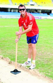 Pitcher imperfect: England's Graeme Swann poses after the bowlers run-up were dug up at the Sir Vivian Richards Stadium on Friday.