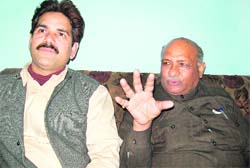 Minority Commission vice-president Amir Ahmed Qadri (R) and Aleem Siddiqui, member of State Minority Working Committee, in Roorkee on Sunday. 