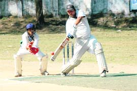 A batsman plays a shot at the Dehradun District Cricket League at Rangers Ground, Dehradun on Sunday. 