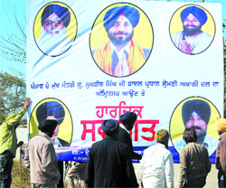 A billboard declares Sukhbir Singh Badal the Punjab Chief Minister in Amritsar on Sunday.
