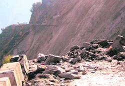 A view of the 200-metre sunken stretch of the Batote-Kishtwar national highway, which recently caved into the Chenab.