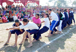 Students participating in a tug-of-war competition during the annual sports meet at Bhag Singh Hayer College for Women in Abohar on Monday.