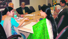 Deputy Commissioner Deepti Umashankar presides over a meeting of the Shri Mata Sheetla Devi Shrine Board in Gurgaon.
