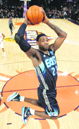 Cleveland Cavaliers' LeBron James goes up for a slam dunk in the fourth quarter of the NBA All-Star basketball game in Phoenix, Arizona, on Sunday.