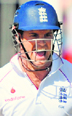 Englands captain Andrew Strauss celebrates after scoring century against the West Indies.
