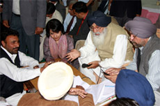 Chief Minister Parkash Singh Badal during sangat darshan at Ghudda village in Bathinda district on Tuesday.