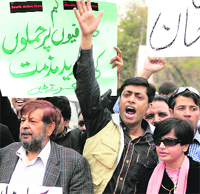 Journalists chant slogans during a protest against the killing of Geo TV reporter Musa Khankhel in Swat valley in Islamabad