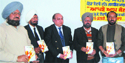 Eminent writers releasing the book Apne Aap Kol written by Jasbir Mahal (not in picture) in Amritsar