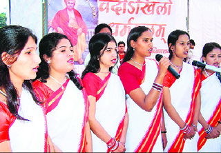Girls perform group song on the concluding day of Gurukul Girls College annual festival.