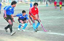 The final of the PN Dhasmana Memorial Hockey Tournament in progress at Parade Ground in Dehradun