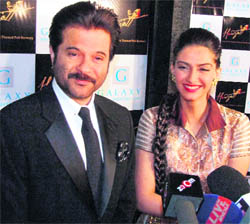 Actor Anil Kapoor with his daughter Sonam Kapoor at a hotel during the premier of the film Delhi 6 in Gurgaon on Thursday.