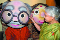 Chief Minister of Delhi Sheila Dikshit visits the stall of directorate of information and publicity at the 'Sankalp Utsav' at Pragati Maidan in New Delhi