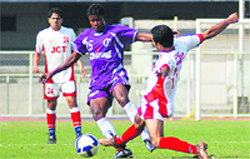 JCTs Amandeep (R) fights for the ball with Chirag Uniteds Sankar Oraon in Ludhiana