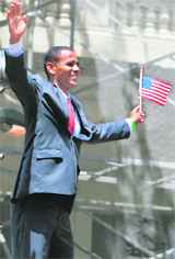 A look-alike of US President Barak Obama stands on a lorry during the Cordao do Bola Preta carnival band parade in Rio de Janerio