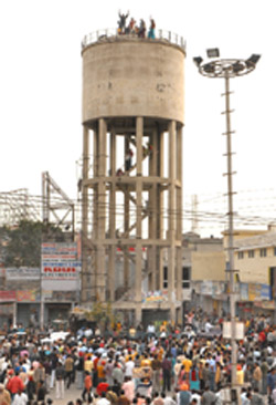 Atop the 70-foot high water tank near the Gol Diggi in Bathinda on Sunday.