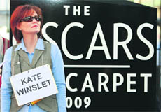Talent stand-in Marie Holton takes the place of actor Kate Winslet during the rehearsal for the red carpet arrival ceremonies in preparation for the 81st Academy Awards in Hollywood.