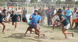 Youngsters play a kabaddi match during a tournament organised by the labour department at Tau Devi Lal Stadium, Sector-38 in Gurgaon