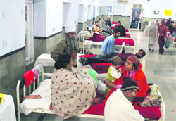 An overcrowded paediatrics ward without any nursing staff in SMGS Hospital in Jammu.
