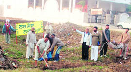 Followers of Sant Nirankari Mandal during a cleanliness drive at Mullanpur Dakha on Monday.