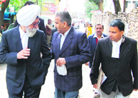 Former Horticulture Minister Singhi Ram arrives at the District and Sessions Court, Dharamsala, in connection with a case of fake certificates 