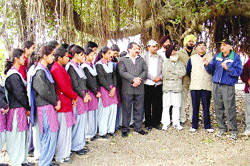 Representatives of various NGOs along with students pray for saving the trees from felling in Amritsar