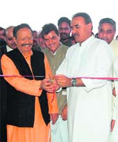 Union Civil Aviation Minister Praful Patel and Uttarakhand Chief Minister BC Khanduri inaugurate the terminal building of the Jolly Grant airport near Dehradun on Wednesday.