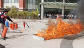 Haryana Fire and Emergency Services personnel carry out a mock drill at Sector-39 Cyber Park in Gurgaon on Thursday.