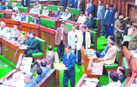 Panthers Party legislators stage a walkout from the Assembly in Jammu