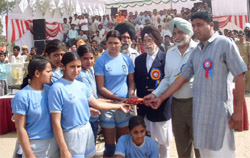 Winner of the Shaheed Navpal Singh Sidhu Memorial Kabaddi Tournament, Guru Nanak College for Girls, Muktsar, receiving the prize on Sunday.