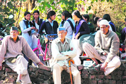 Senior citizens bask in the winter sun in Dehradun.