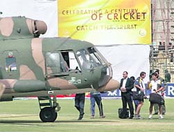 Sri Lankan cricket team members prepare to board a Pakistani military helicopter at the Gaddafi stadium.