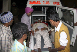 An injured Dera follower being taken to Civil Hospital, Bathinda 