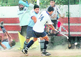 A player nets a goal in the final of the Chandigarh State Hockey Championship in Chandigarh on Thursday.