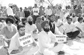 Villagers protest against setting up of a liquor manufacturing unit at Sandharsi village, near Ghanaur