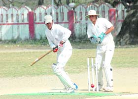 A batsman tackles a delivery at the semifinal match in the 57th District Cricket League at Survey Stadium, Dehradun