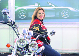 This foreign tourist checks out a bike at the Auto Mall in Sector 17
