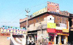 Hoardings of political parties still exist in the Lal Singh Basti area of Bathinda violating the model code of conduct.