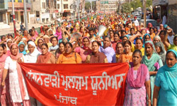 Anganwari workers carrying out a protest march in Bathinda on Sunday.
