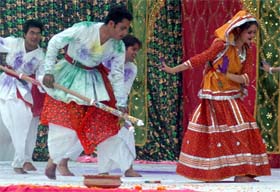 Students of Guru Gobind Singh Dental College play Holi during a function at their college in Gurgaon