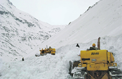 A snow-clearing machine at work on the Manali-Rohtang road, near the Beas nullah, about 32 km from Manali,