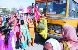 Members of the Anganwari Mulazim Union, Punjab, during their protest at the BMC chowk in Jalandhar