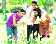 Visitors to a flower show in Hisar.